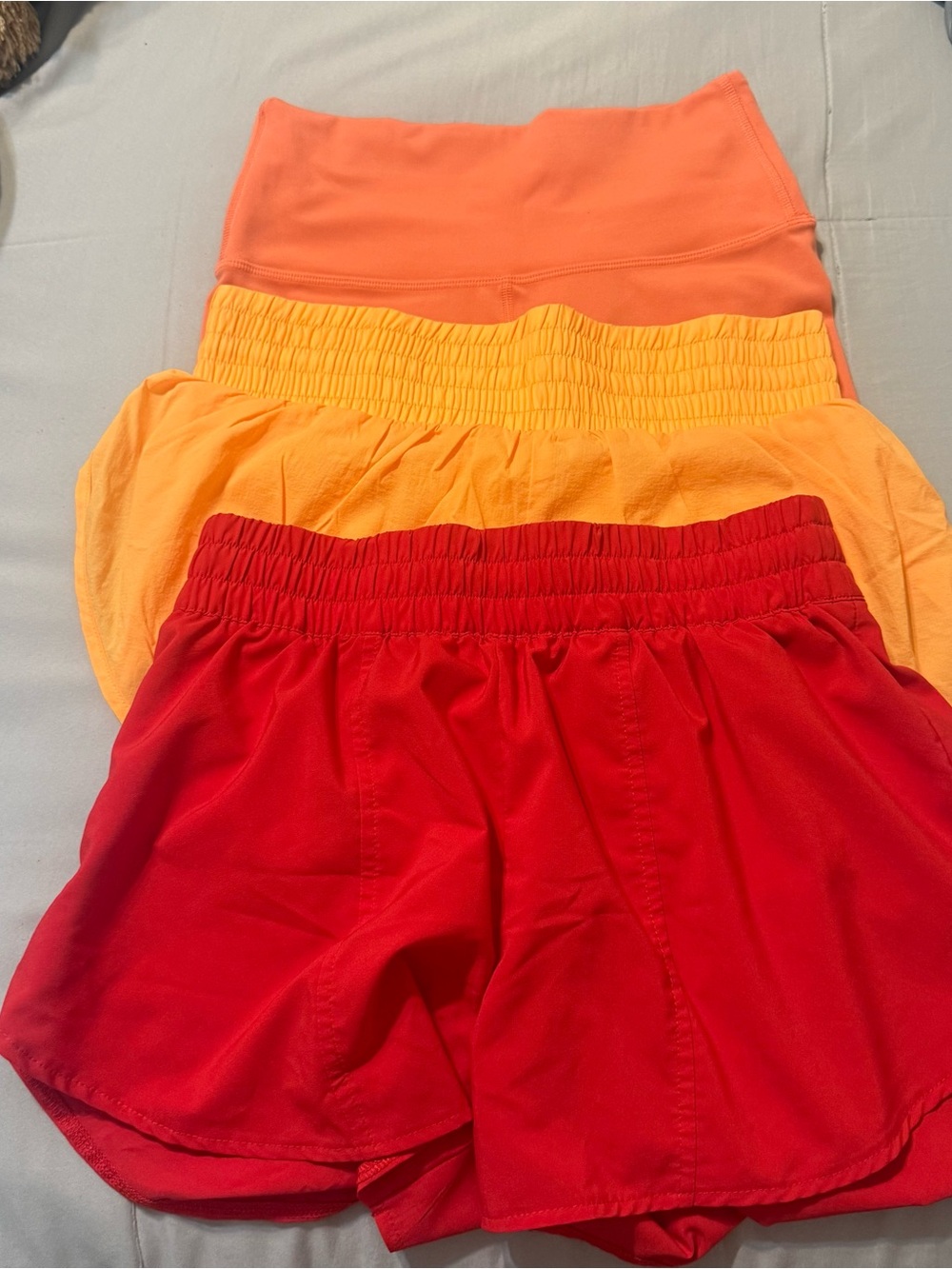 All in Motion Women’s Athletic Shorts - Set of 3 - size small-red, orange, Coral